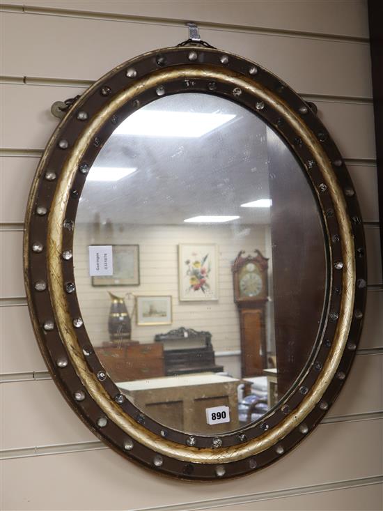 A 19th century oval Irish paste mounted mirror H.62cm